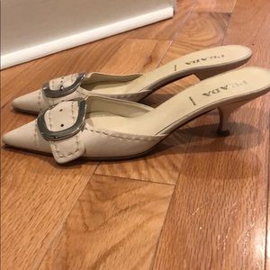 Cream Prada kitten heel slides